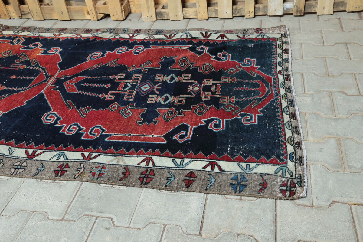 Incisema runner: 1970s handmade Anatolian runner with oriental motifs and cotton backing