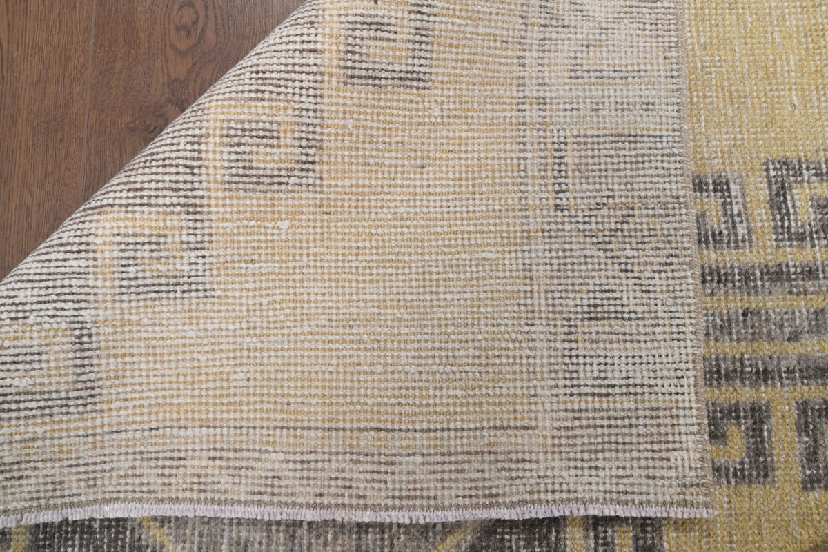 Sevgisel runner: 1970s handmade Anatolian runner with ikat motifs and cotton backing
