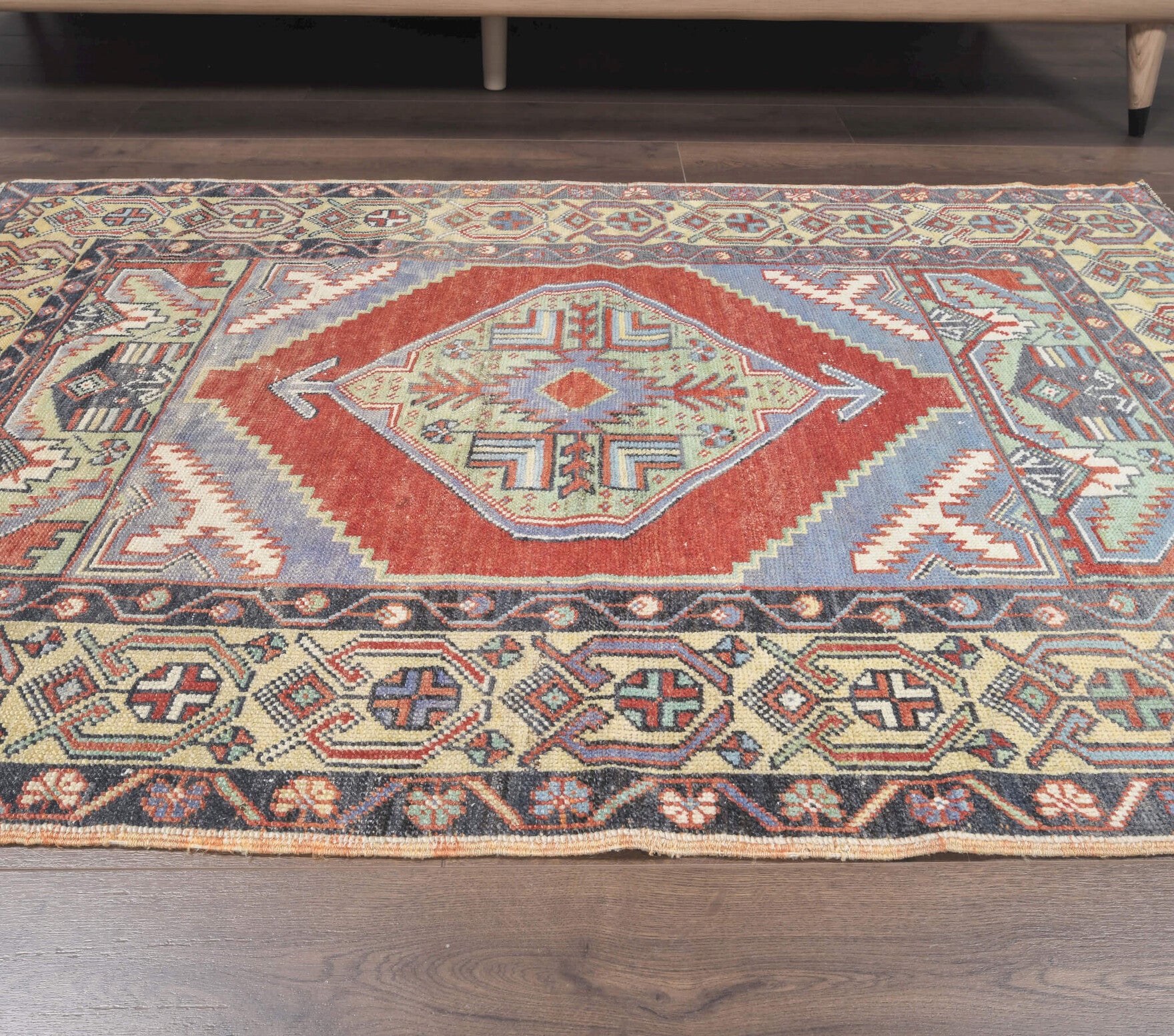 Nergisever rug: 1970s handmade Anatolian rug with oriental motifs and cotton backing