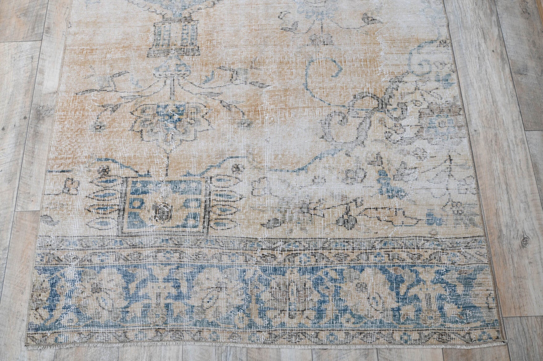 Fidansultan rug: 1970s handmade Anatolian rug with oriental motifs and cotton backing
