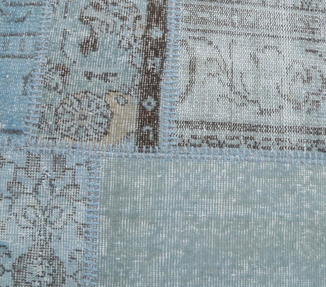 Hesperpetra rug: 1970s handmade Anatolian rug and fabric backing