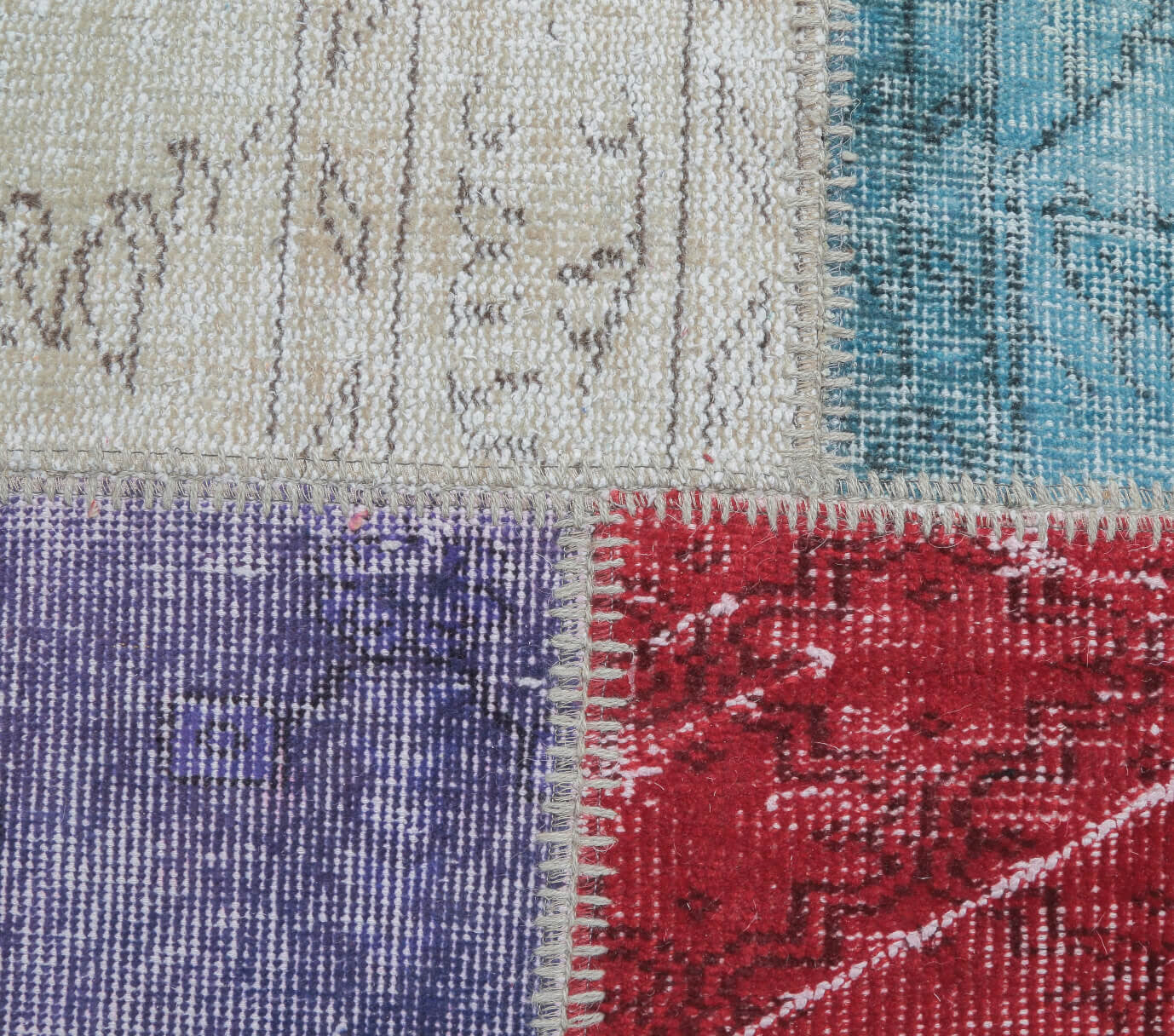 Gulru rug: 1970s handmade Anatolian rug with solid motifs and fabric backing