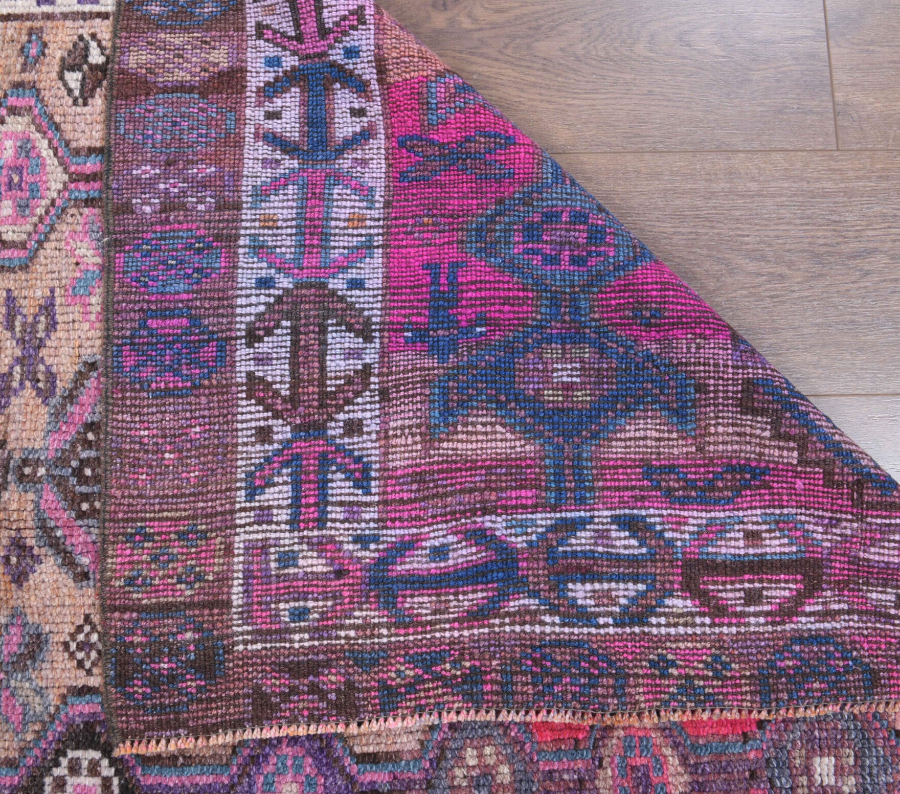 Cansultan rug: 1970s handmade Turkish rug with ikat motifs and cotton backing