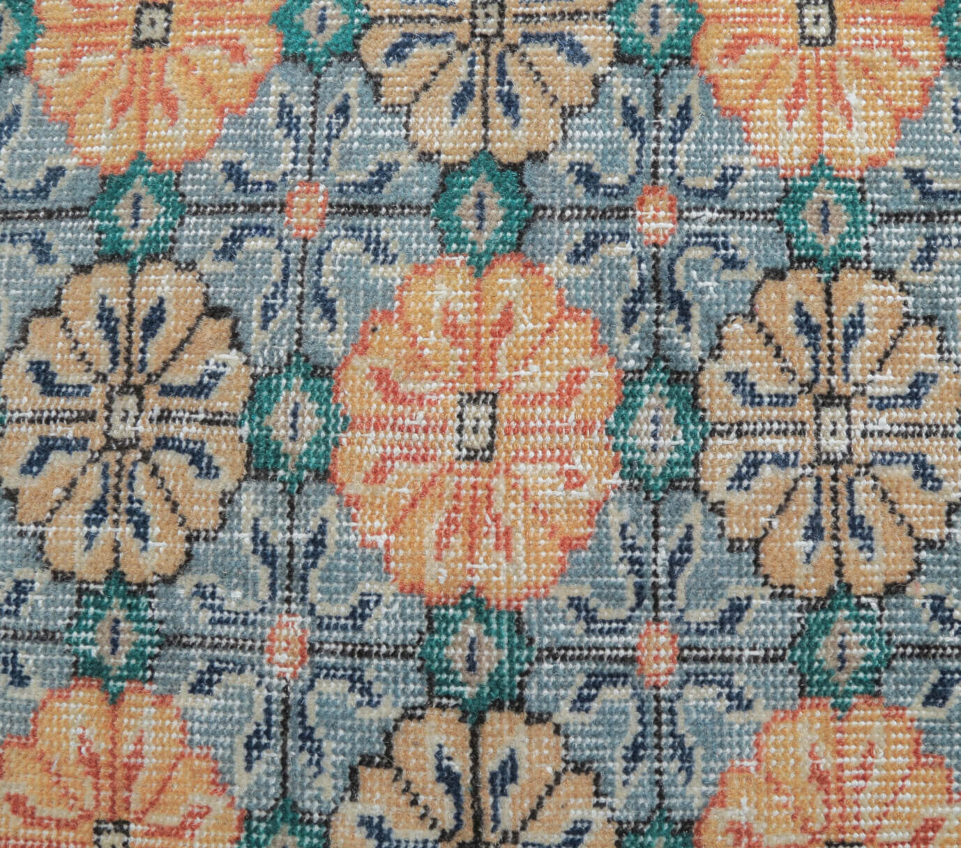 Ioniamelpe rug: 1970s handmade Anatolian rug with ikat motifs and cotton backing