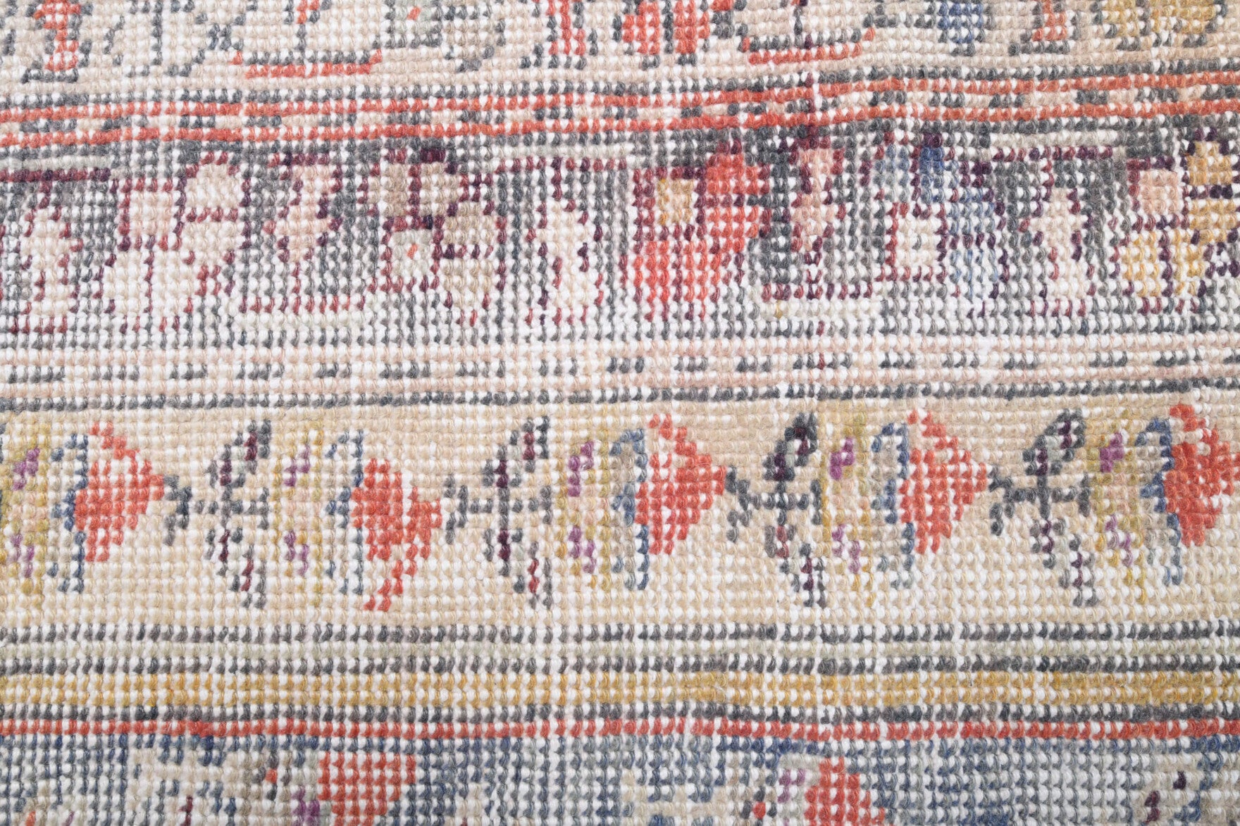 Eunassa rug: 1970s handmade Anatolian rug with ikat motifs and cotton backing