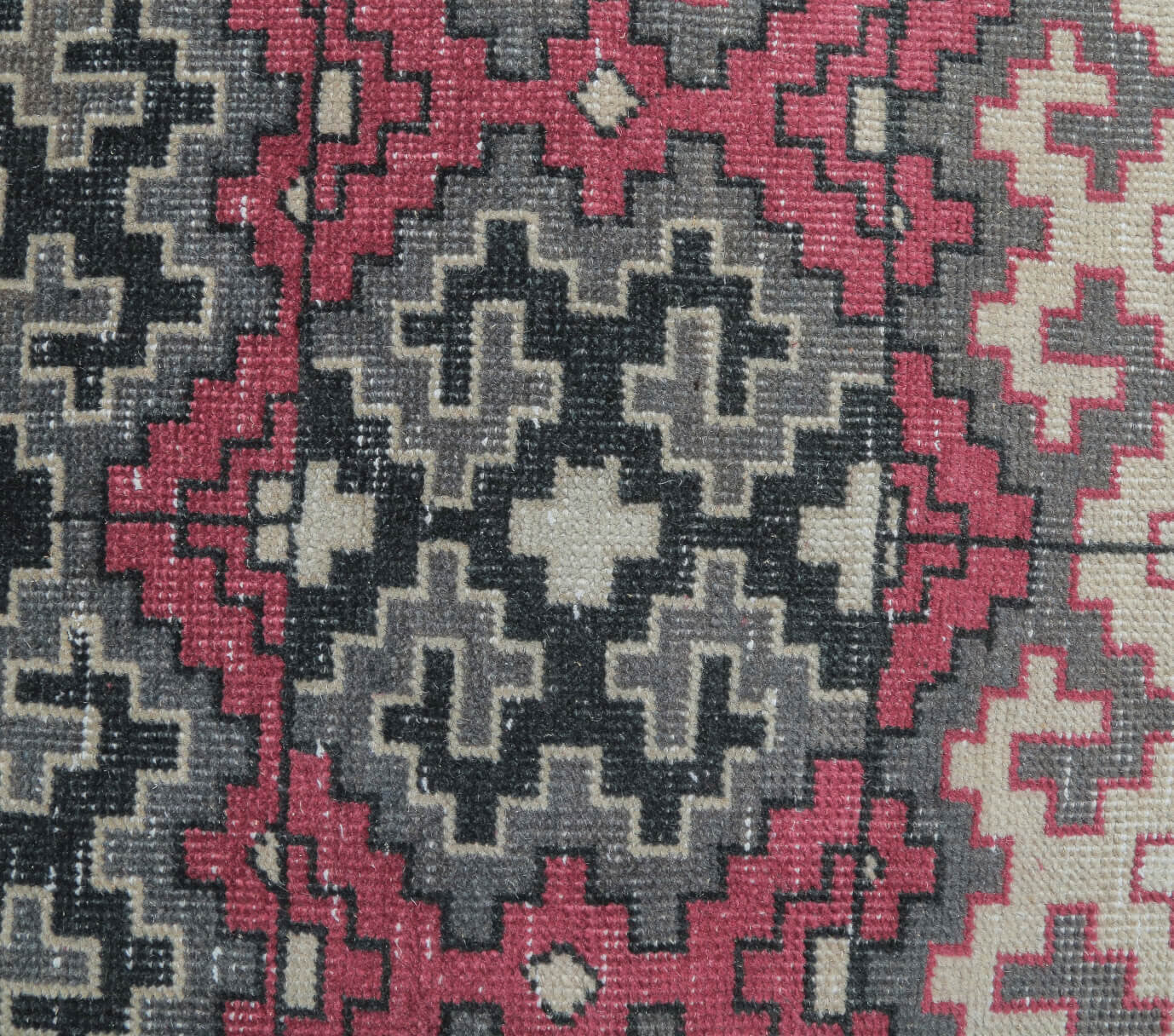 Hebe rug: 1970s handmade Anatolian rug with geometric motifs and cotton backing