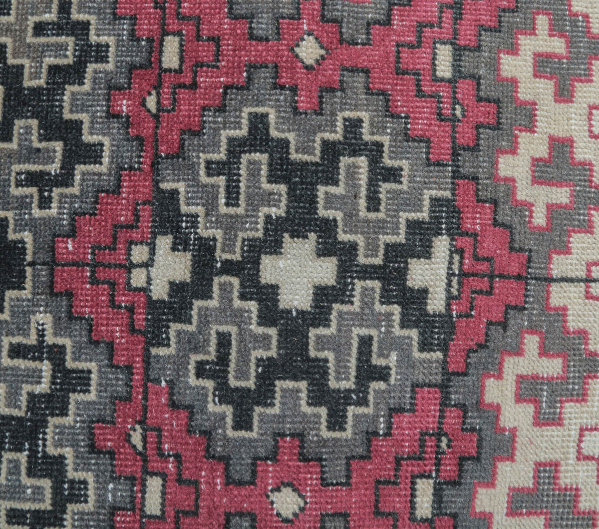 Hebe rug: 1970s handmade Anatolian rug with geometric motifs and cotton backing