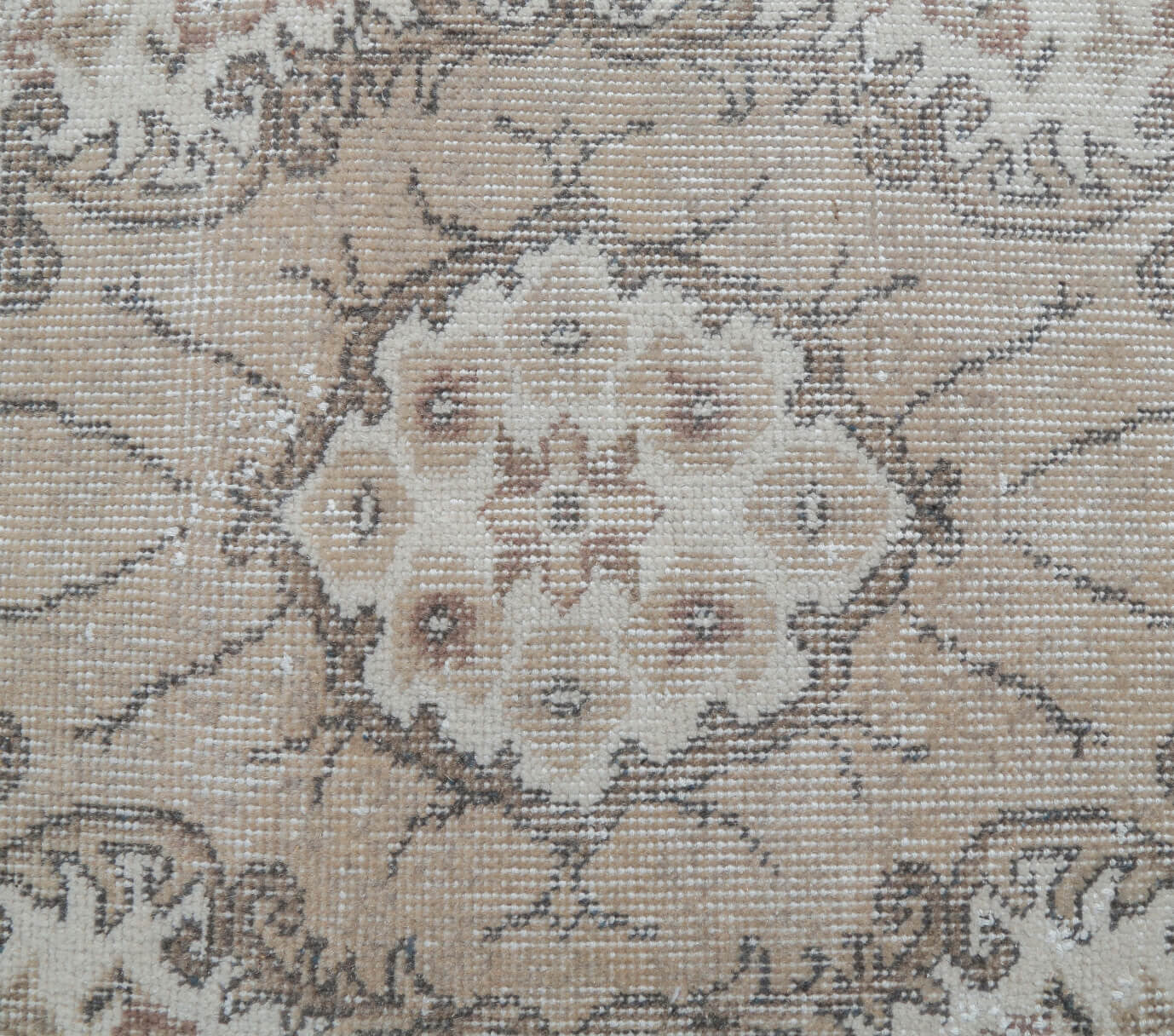 Husnban rug: 1970s handmade Turkish rug with oriental motifs and cotton backing