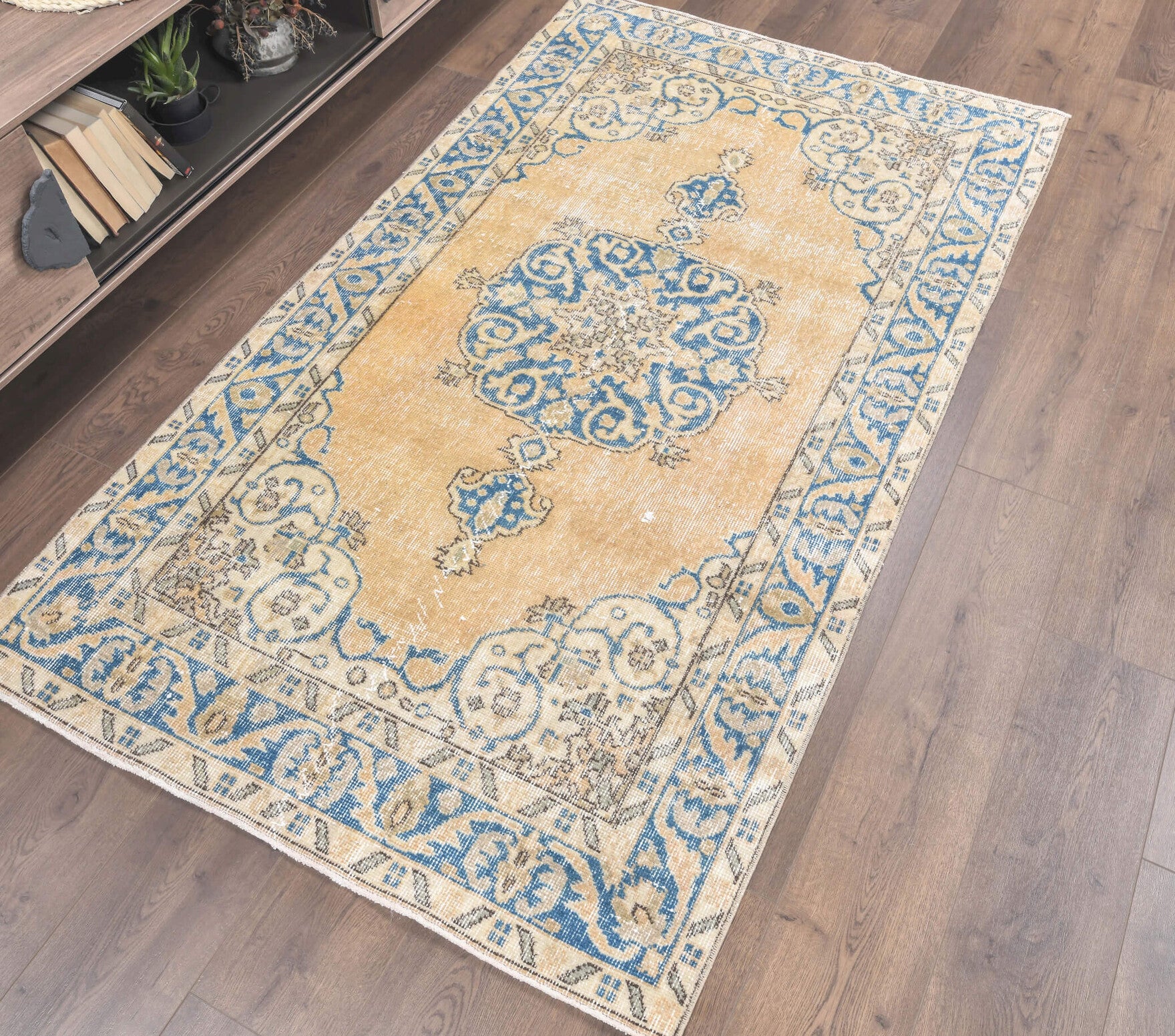 Isophrosyne rug: 1970s handmade Anatolian rug with oriental motifs and cotton backing