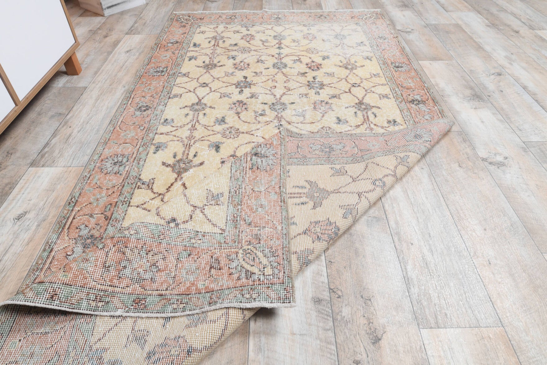Authentic Anatolian vintage area rug (1970s) with bordered and floral design – one-of-a-kind at Fame Rugs
