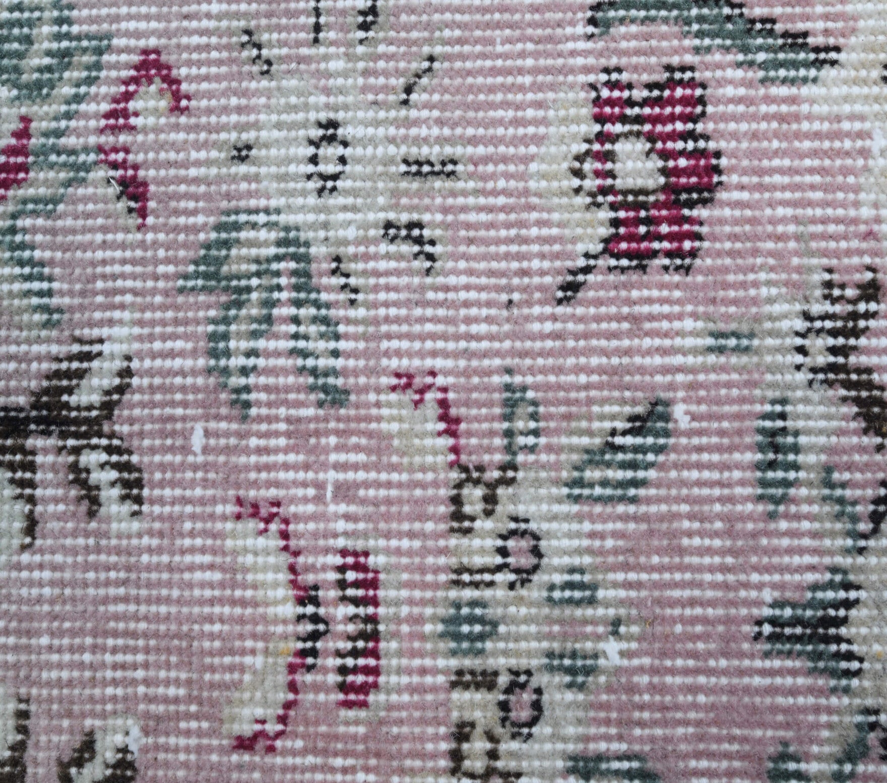 Pyrronia rug: 1970s handmade Anatolian rug with floral motifs and cotton backing