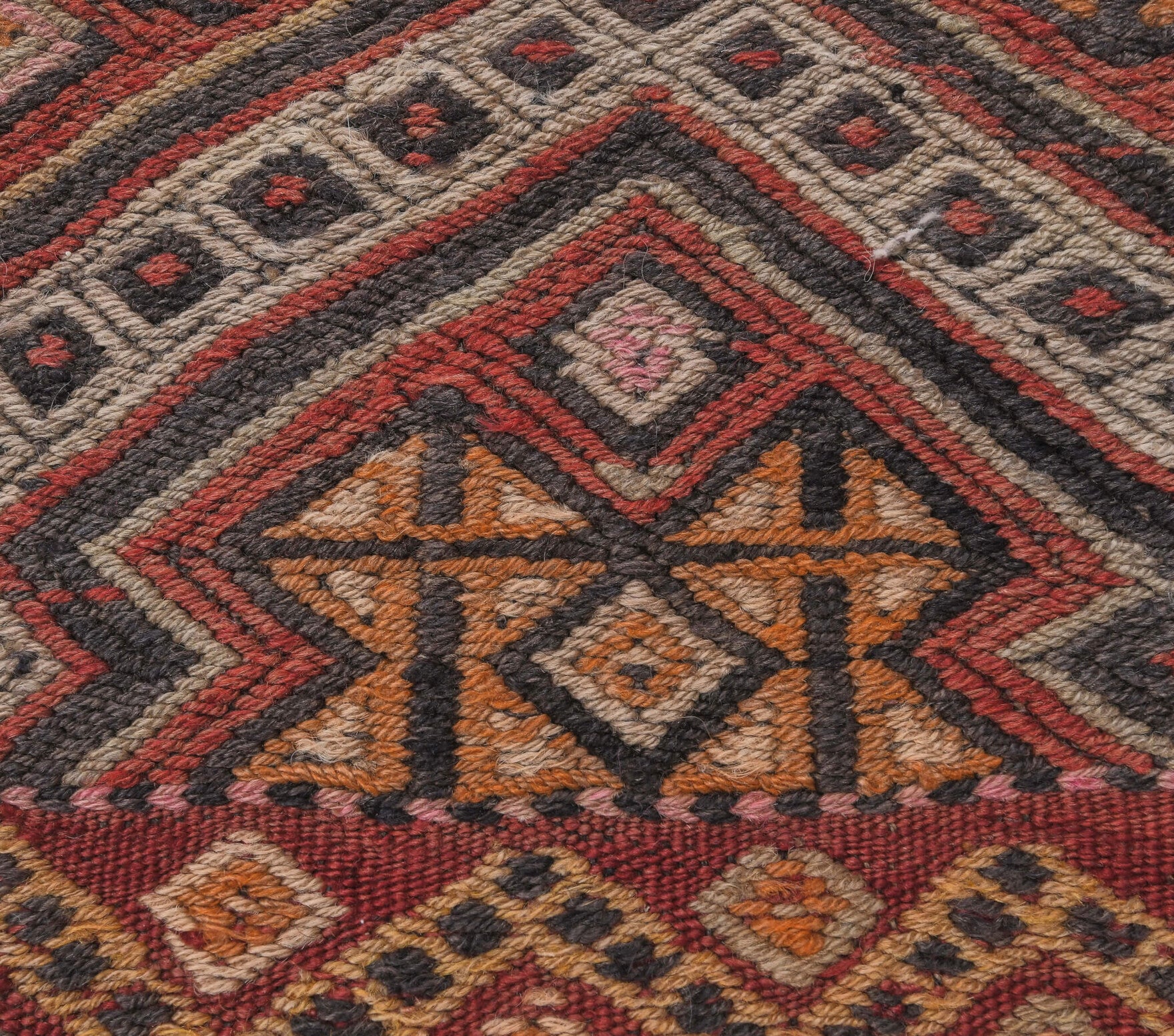 Yelizbike kilim: 1960s handwoven flatweave Anatolian kilim with tribal motifs