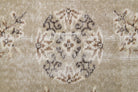 Gumusluk rug: 1970s handmade Anatolian rug with floral motifs and cotton backing