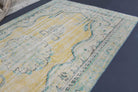 Hedypheme rug: 1940s handmade Anatolian rug with oriental motifs and cotton backing