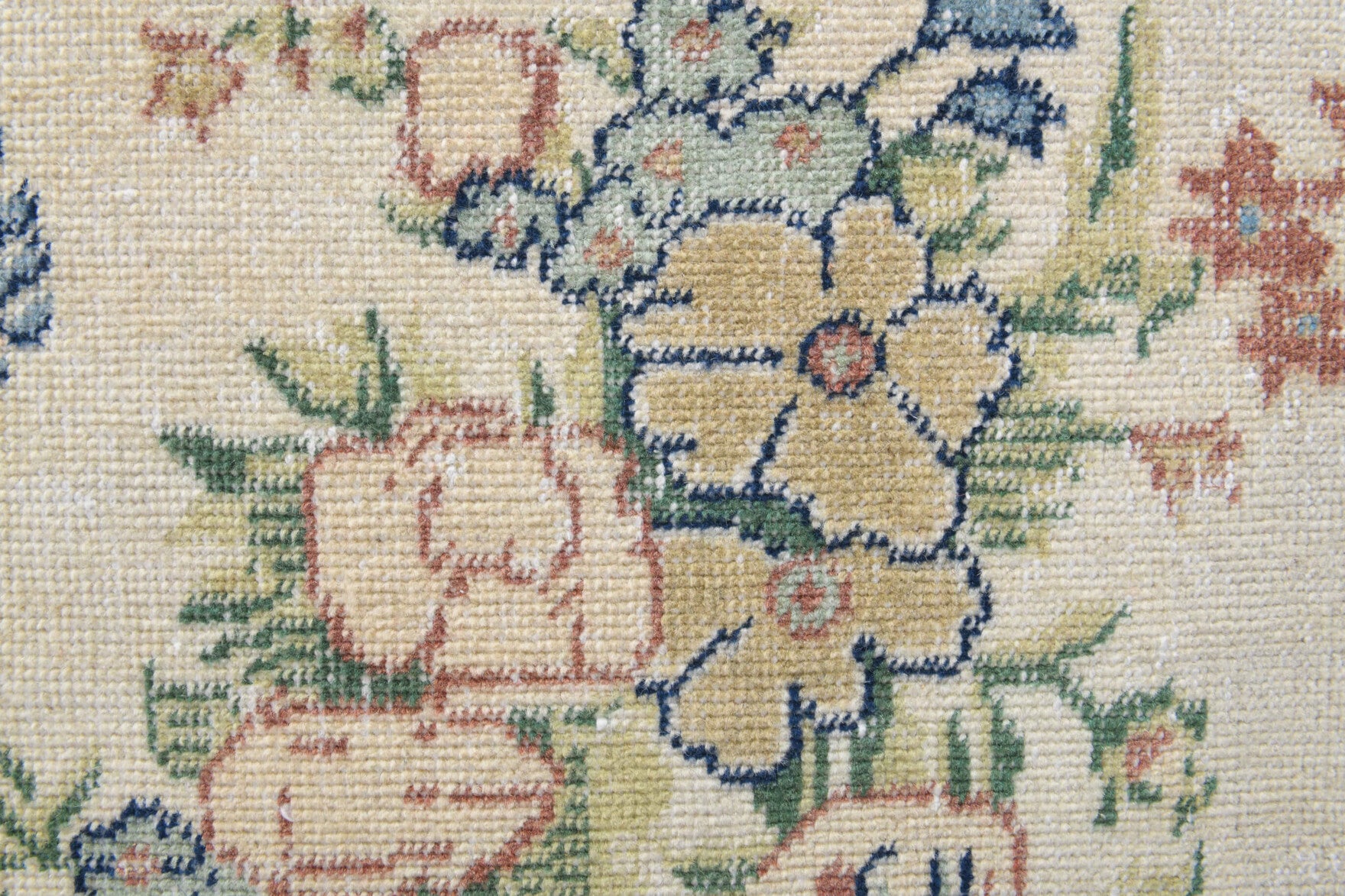 Hazanefruz rug: 1970s handmade Anatolian rug with floral and bordered motifs and cotton backing