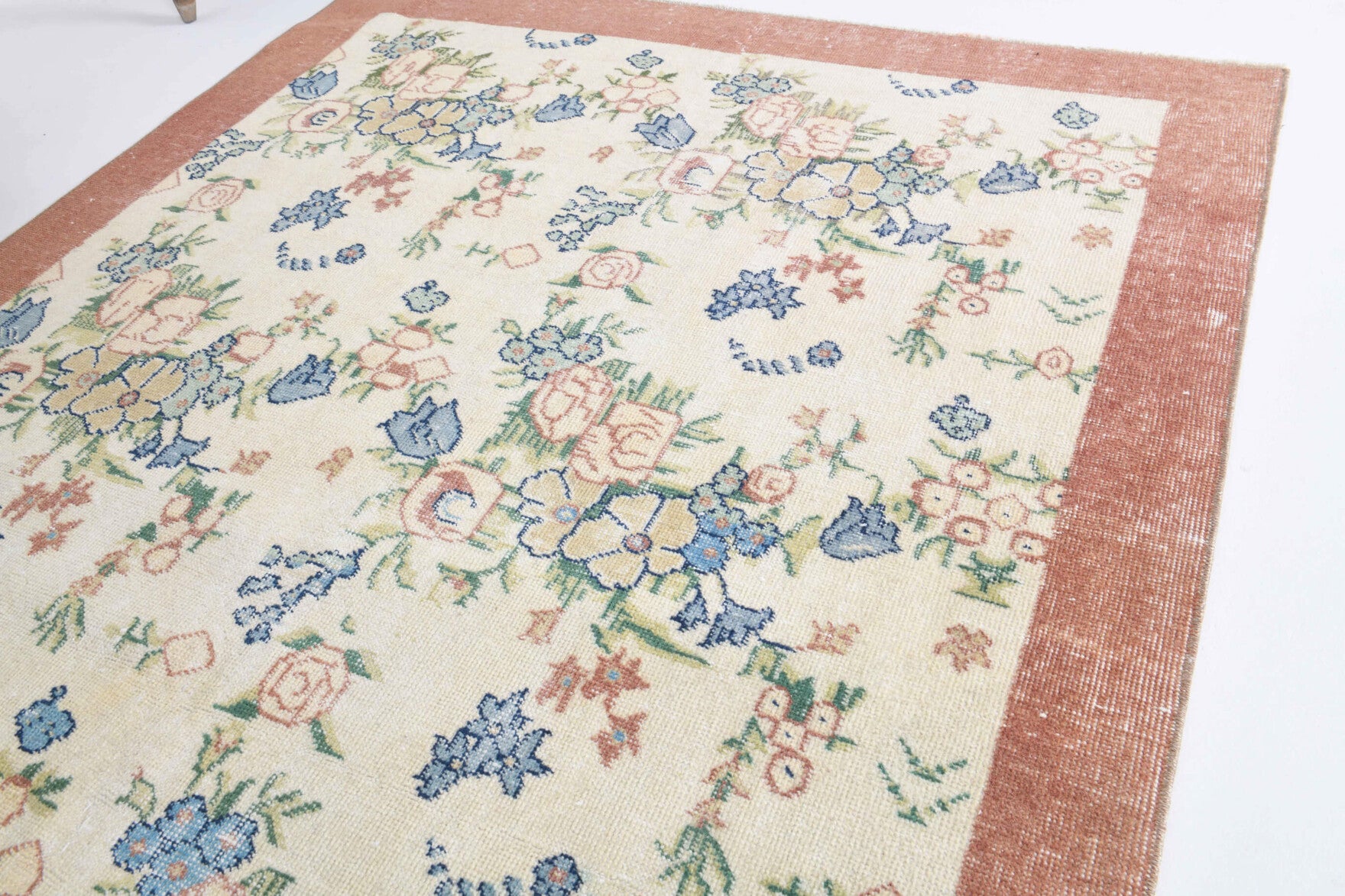 Authentic Anatolian vintage area rug (1970s) with floral and bordered design – one-of-a-kind at Fame Rugs