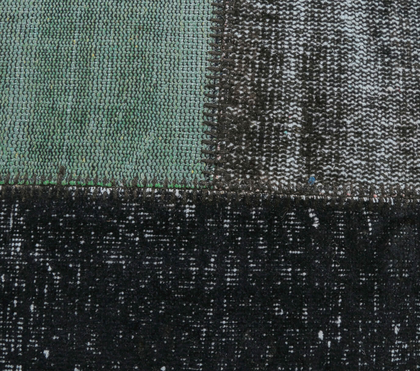 Chrysosela rug: 1970s handmade Anatolian rug with solid motifs and fabric backing