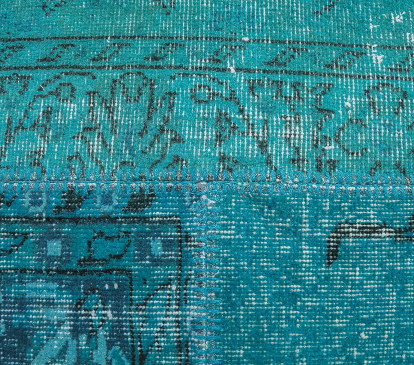 Hedyphone rug: 1970s handmade Anatolian rug with abstract motifs and fabric backing