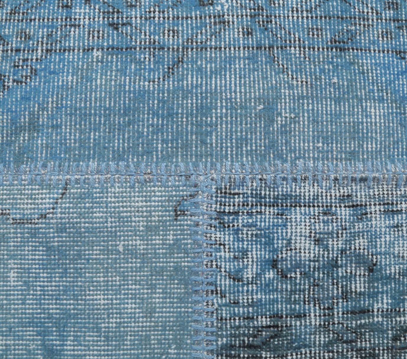 Humasu rug: 1970s handmade Anatolian rug with solid motifs and fabric backing
