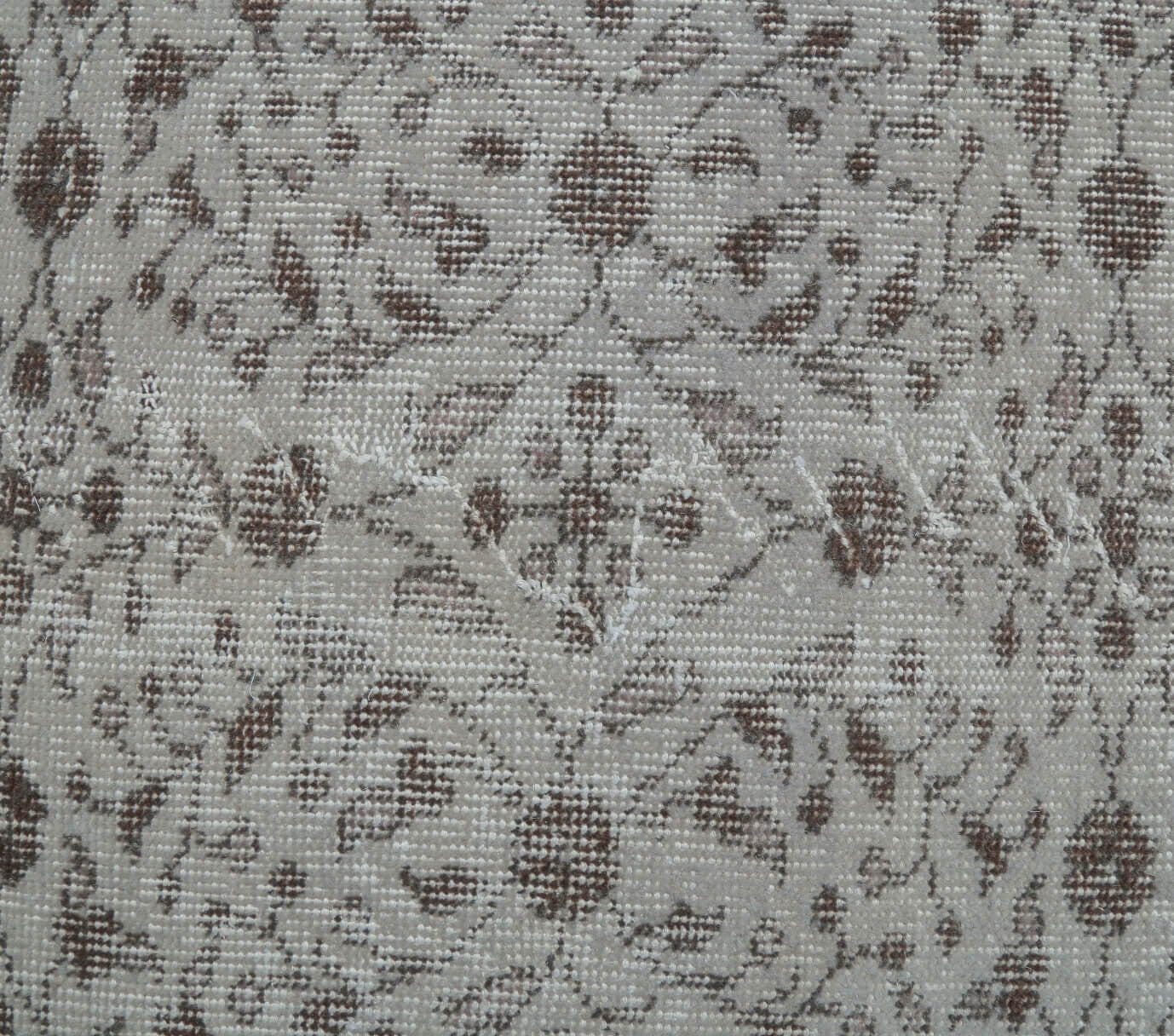 Defnesema rug: 1970s handmade Anatolian rug with ikat motifs and cotton backing