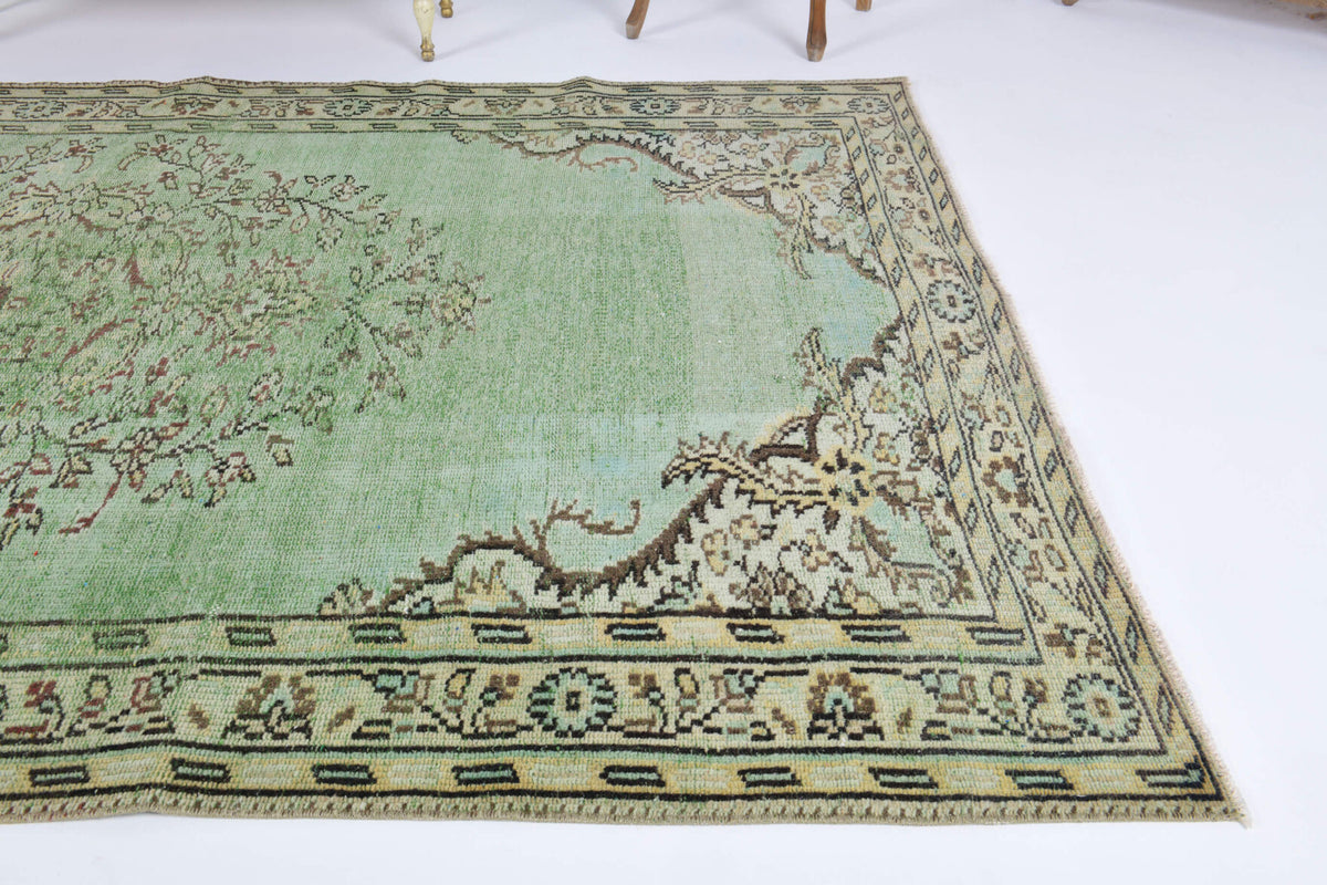Nevresgul rug: 1970s handmade Anatolian rug with oriental motifs and cotton backing
