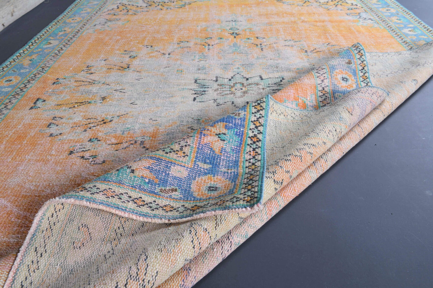 Hedyphrosyne rug: 1970s handmade Anatolian rug with oriental motifs and cotton backing