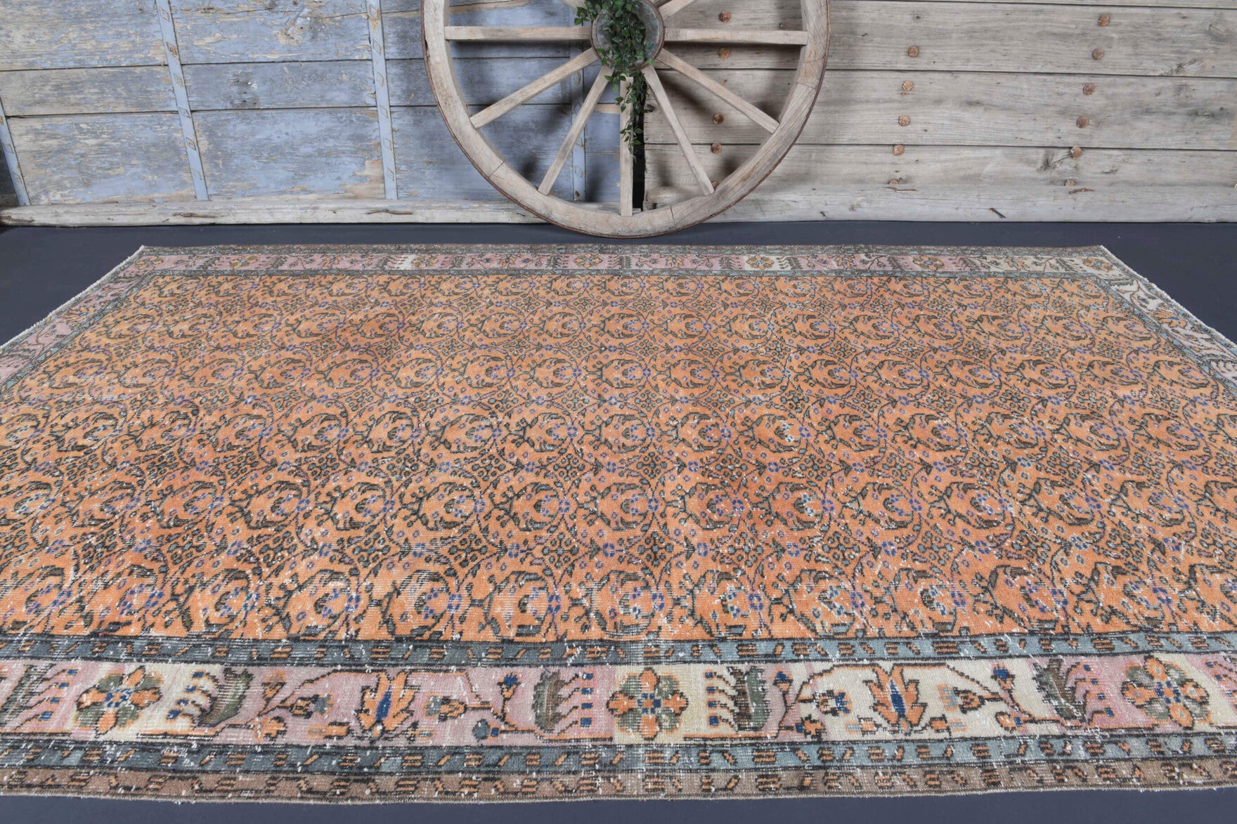 Goncagul rug: 1970s handmade Turkish rug with floral motifs and cotton backing