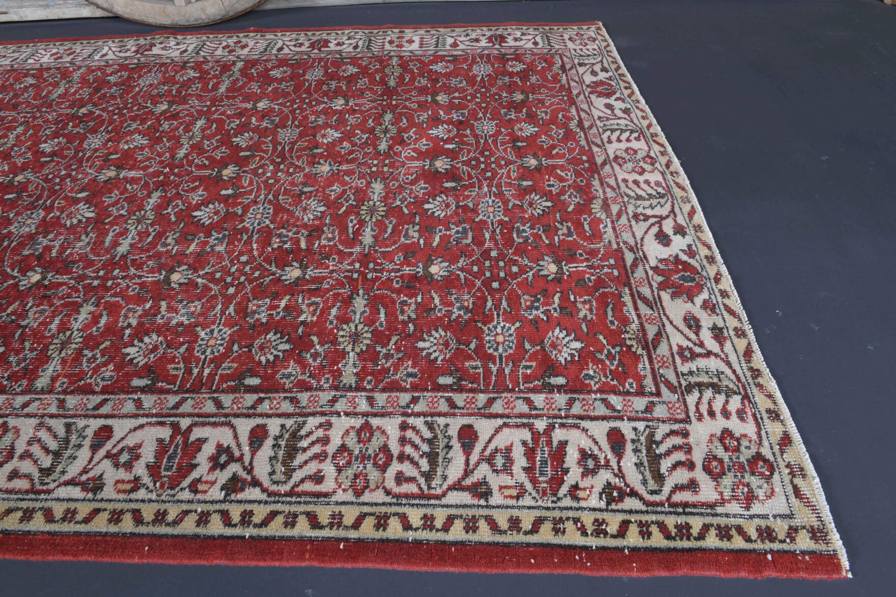 Goncaban rug: 1970s handmade Anatolian rug with floral motifs and cotton backing