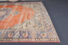 Bengipezir rug: 1970s handmade Anatolian rug with floral motifs and cotton backing
