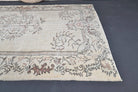 Bariyat rug: 1970s handmade Anatolian rug with oriental motifs and cotton backing