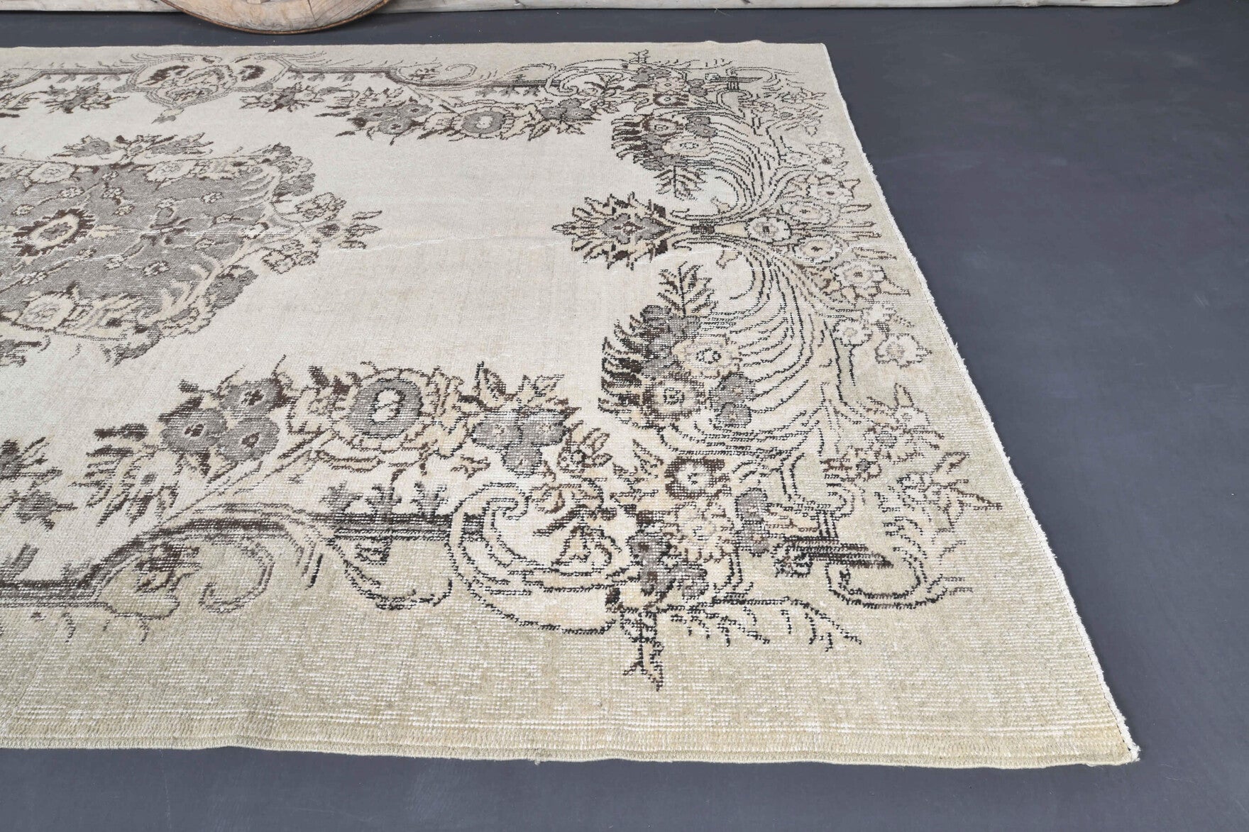 Bahartac rug: 1970s handmade Anatolian rug with floral motifs and cotton backing