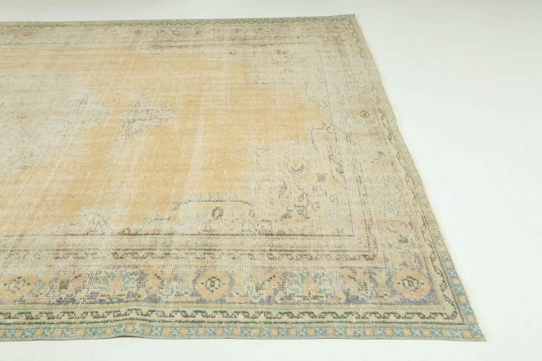 One-of-a-kind 1950s Anatolian antique washed vintage area rug in wool, 6' x 8'10"