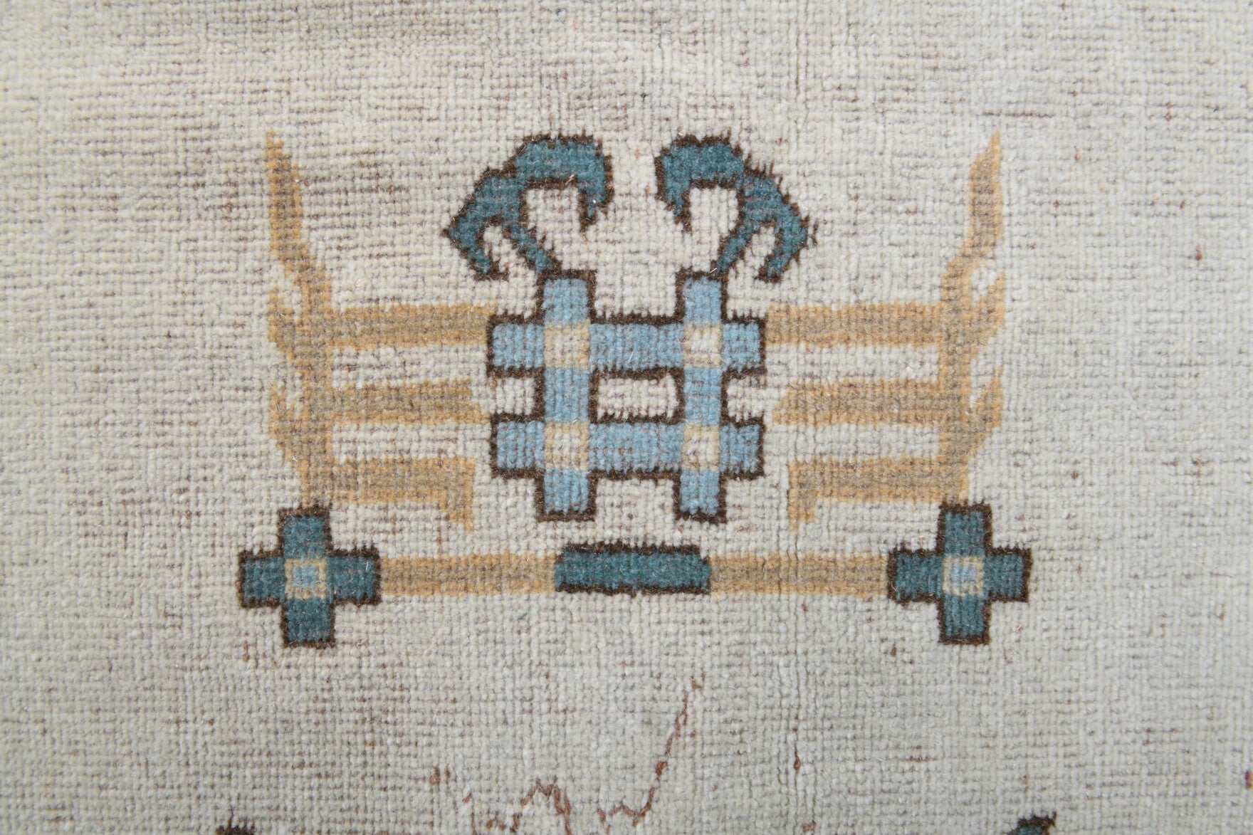 Adadeniz rug: 1970s handmade Anatolian rug with bordered and floral motifs and cotton backing
