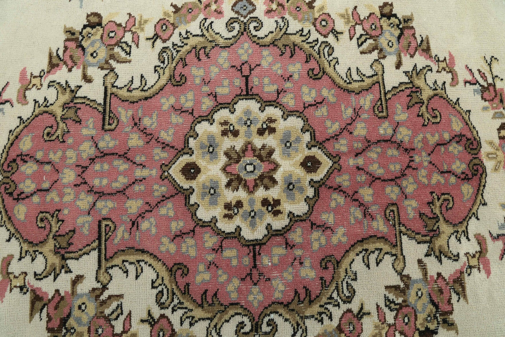 Aristonia rug: 1970s handmade Anatolian rug with floral motifs and cotton backing