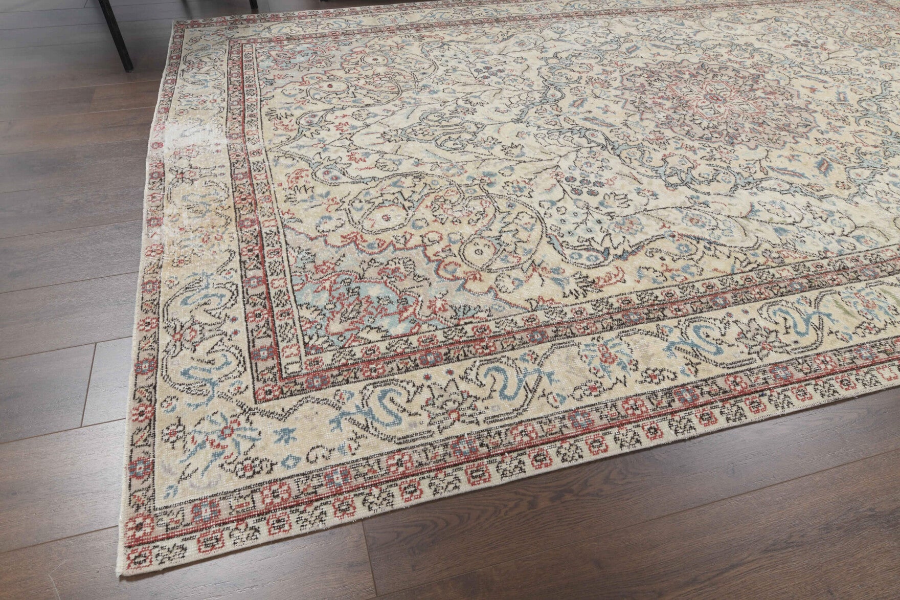 Ianthesthene rug: 1970s handmade Anatolian rug with floral motifs and cotton backing