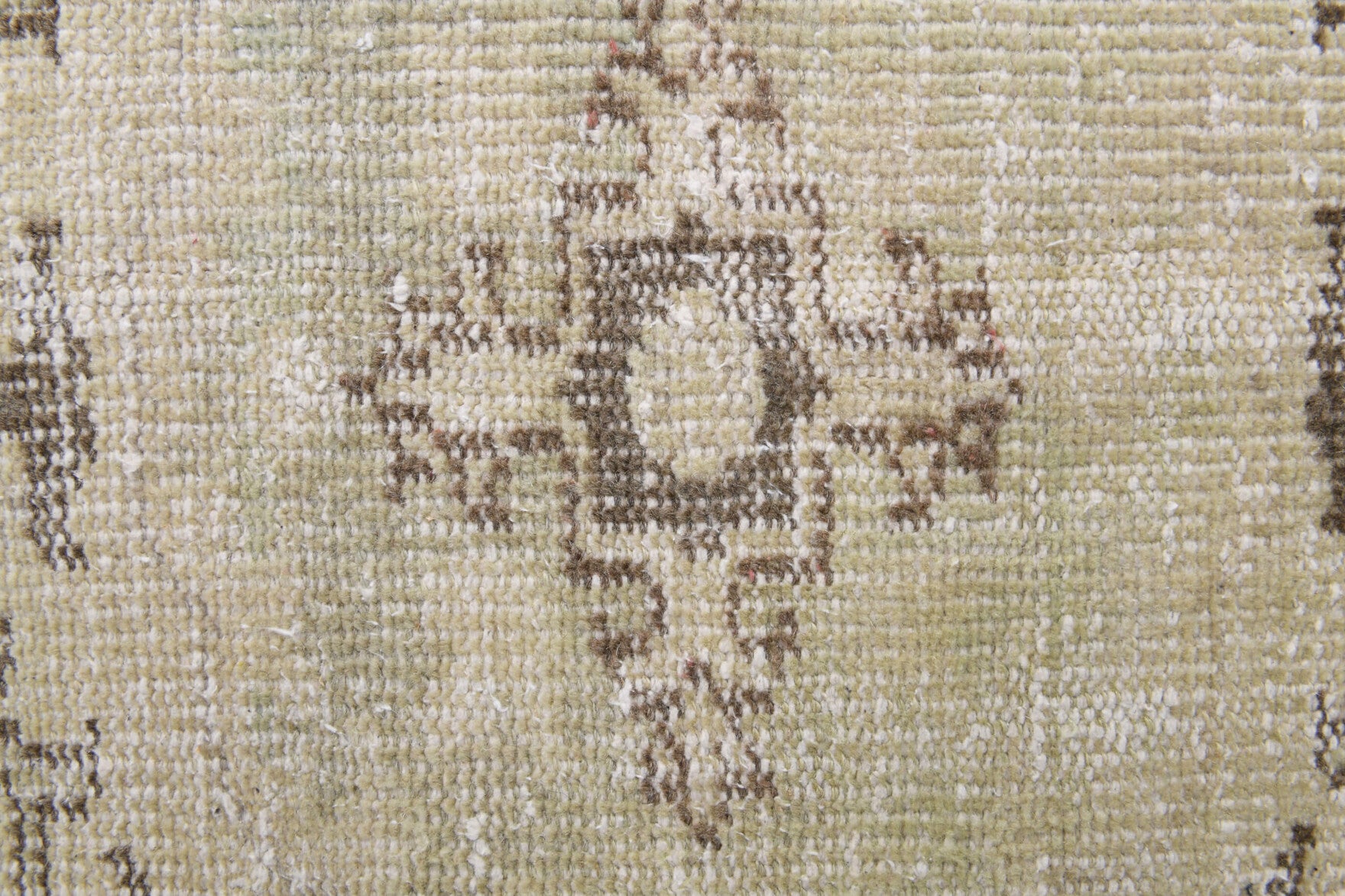 Zuhreperver rug: 1970s handmade Anatolian rug with oriental motifs and cotton backing