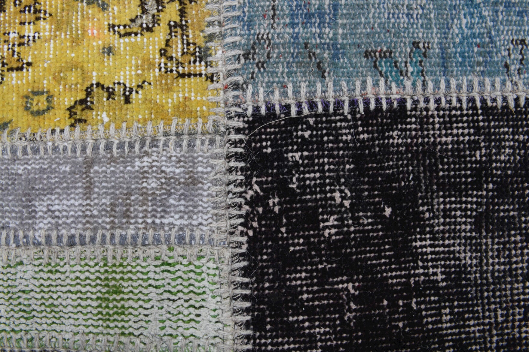Aretepheme rug: 1970s handmade Anatolian rug with tribal motifs and fabric backing