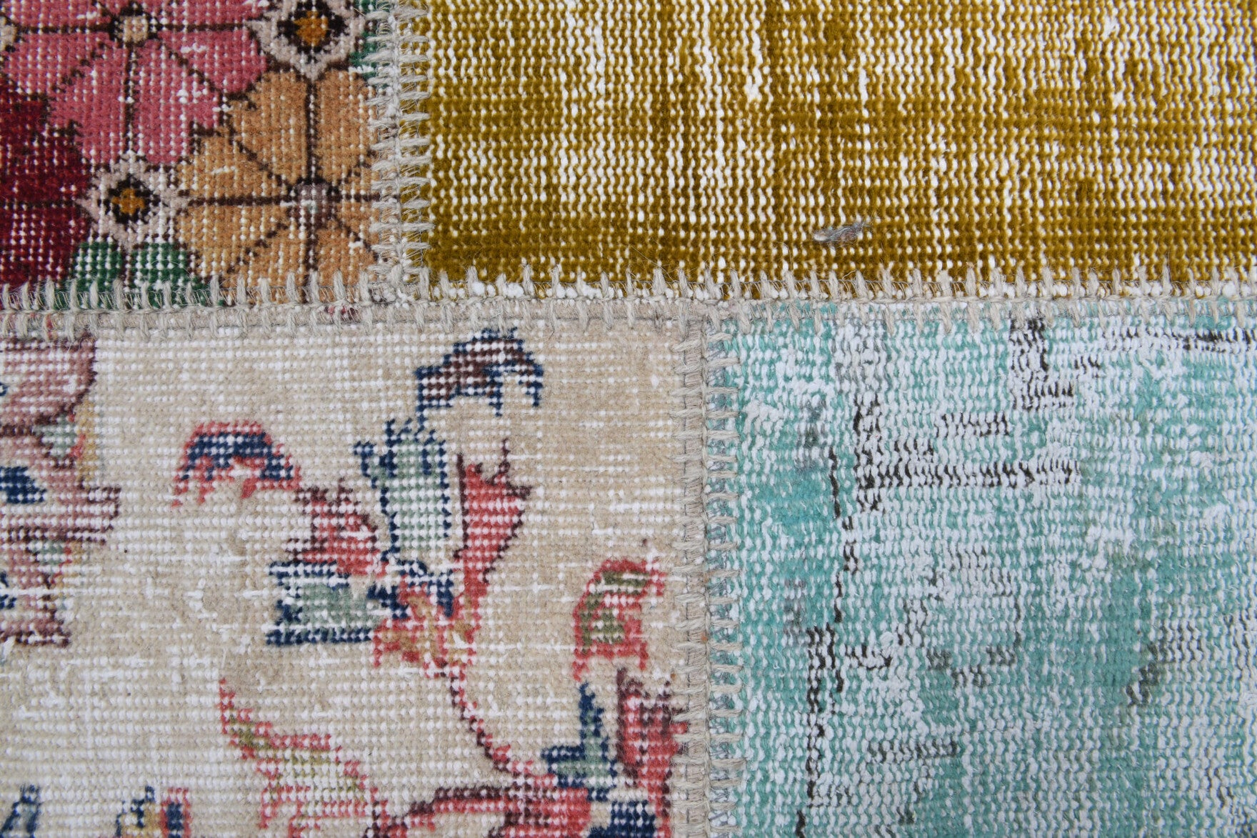Anemokleia rug: 1970s handmade Anatolian rug with tribal motifs and fabric backing