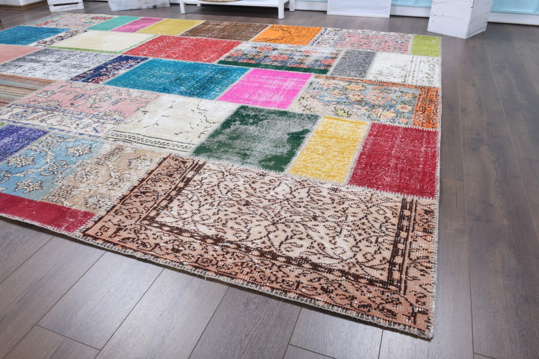 Ahuruh rug: 1970s handmade Anatolian rug with tribal motifs and fabric backing