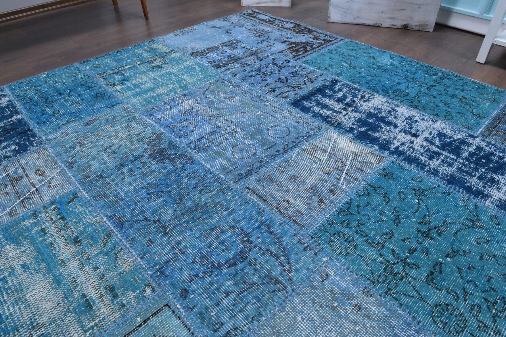 Ardicnisin rug: 1970s handmade Anatolian rug with tribal motifs and fabric backing