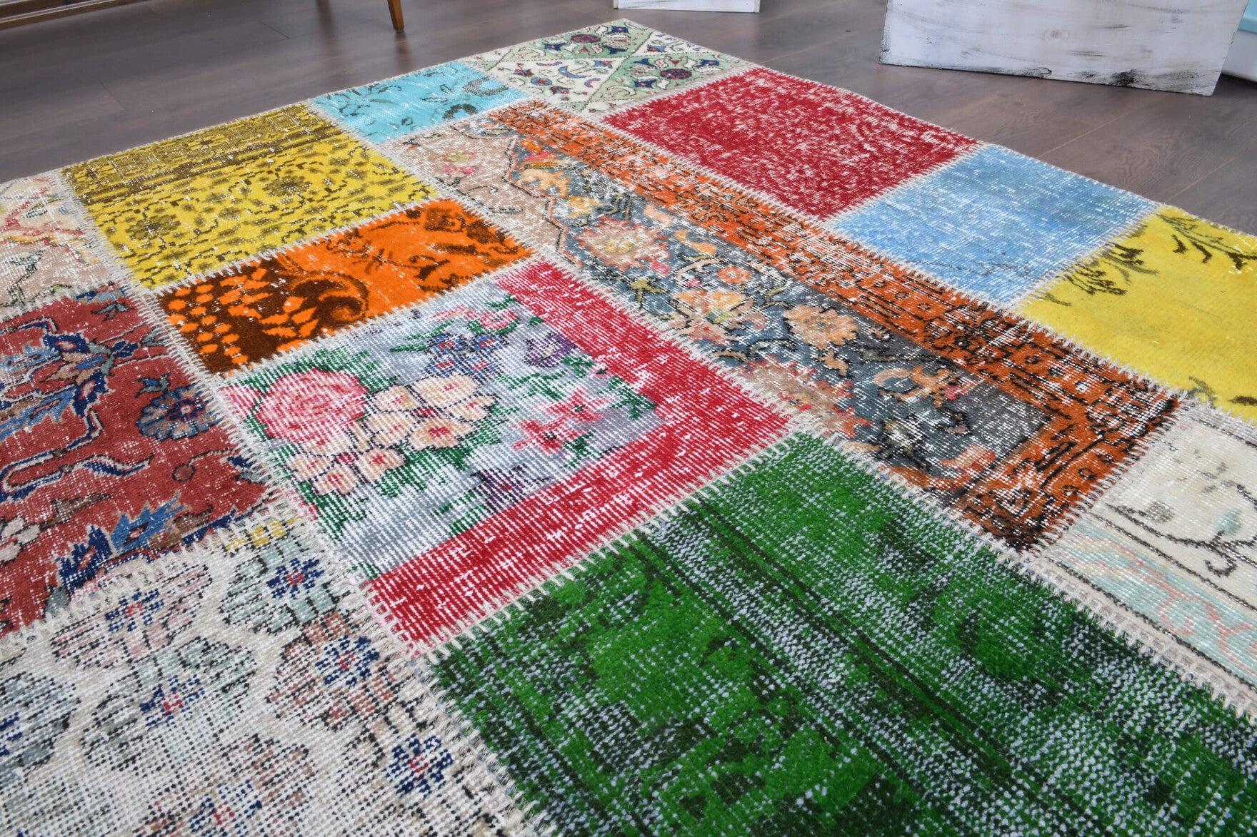 Ahutac rug: 1970s handmade Anatolian rug with tribal motifs and fabric backing