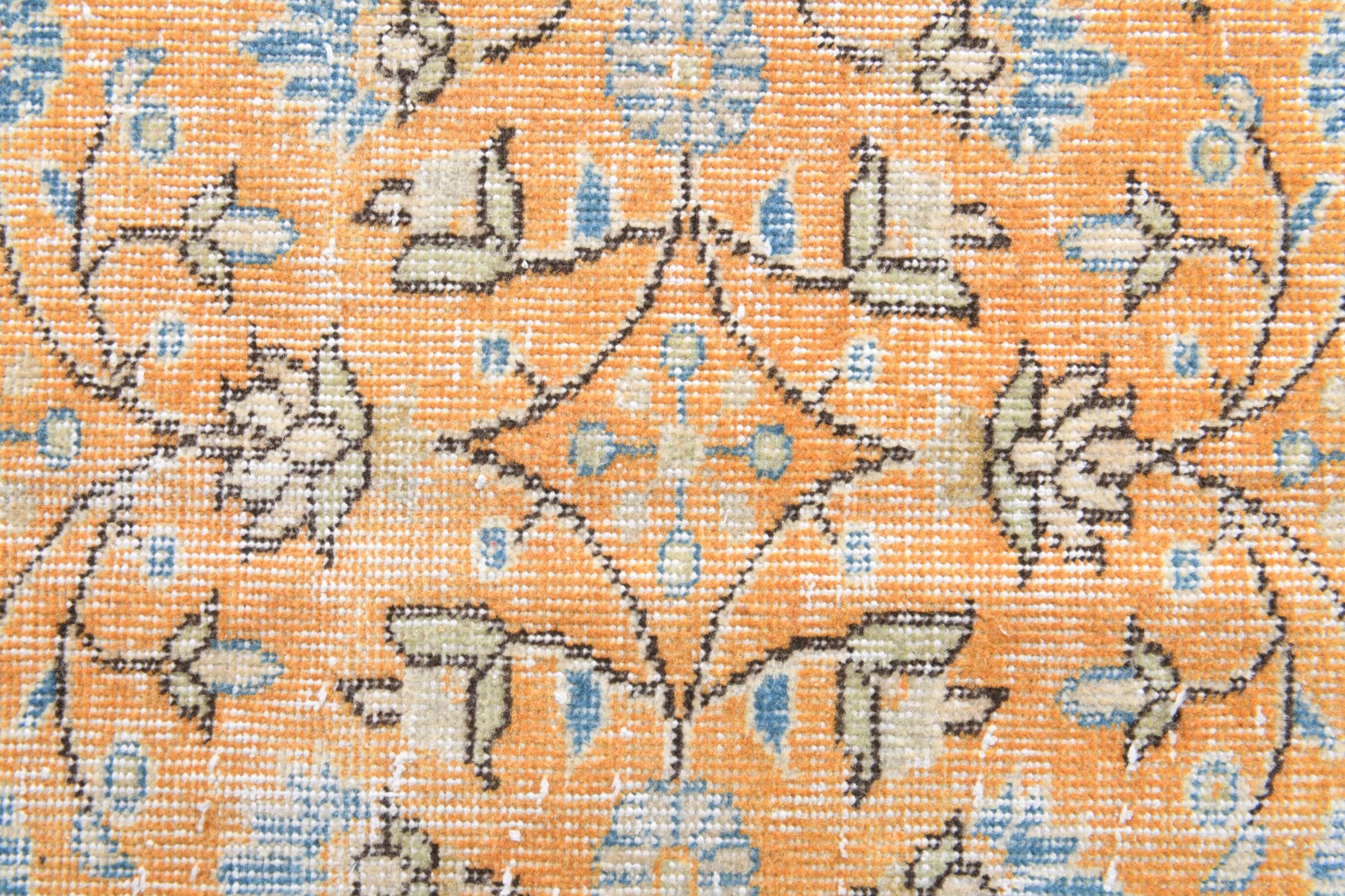 Esenperi rug: 1970s handmade Anatolian rug with floral motifs and cotton backing