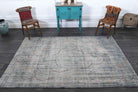 Aglaolyra rug: 1950s handmade Anatolian rug with solid motifs and cotton backing