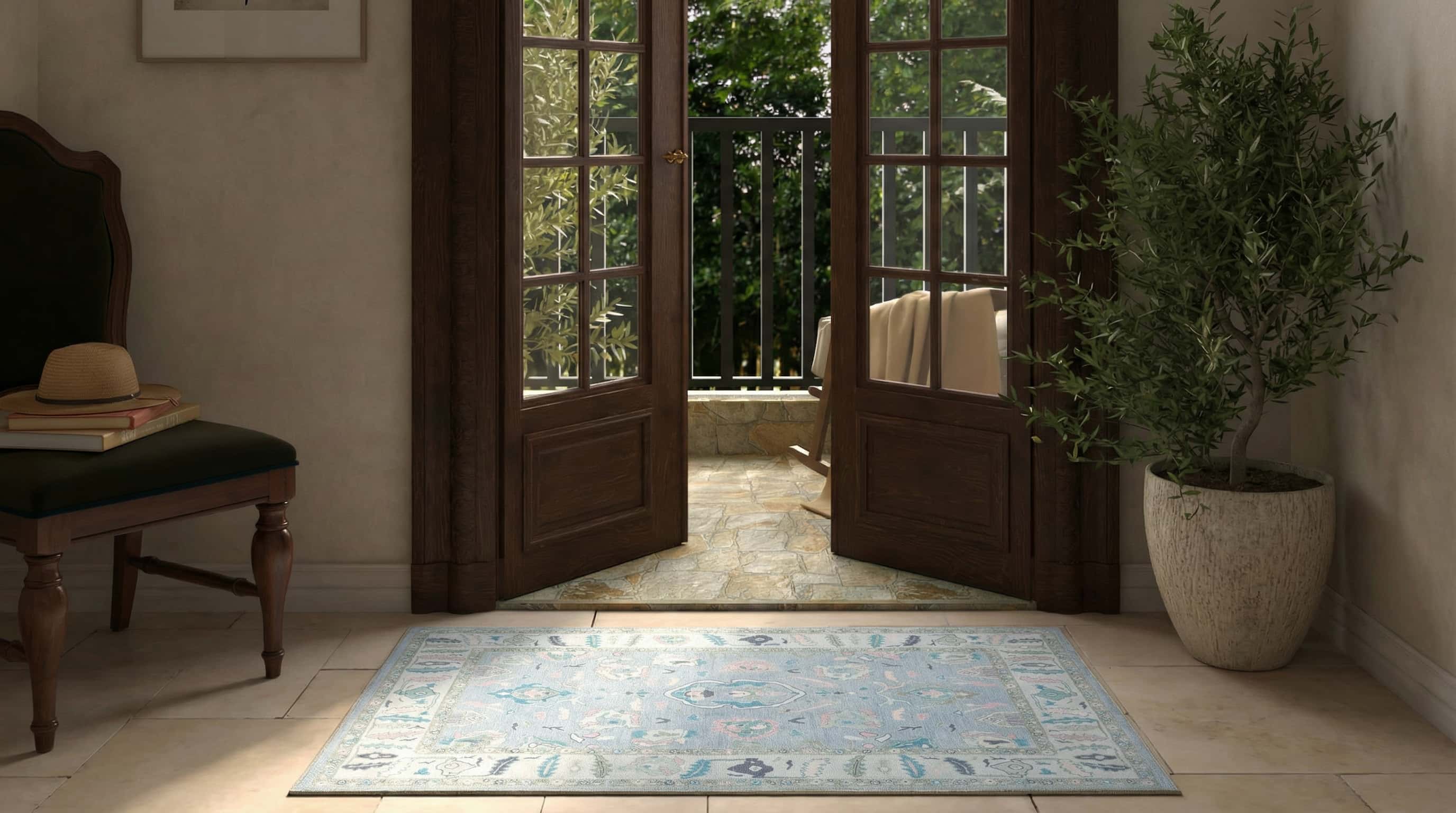 Living room with open French doors leading to a garden, featuring a rug and a chair. Aviana Pastel Lavender Modern Oushak Rug 2x3 - Fame Rugs