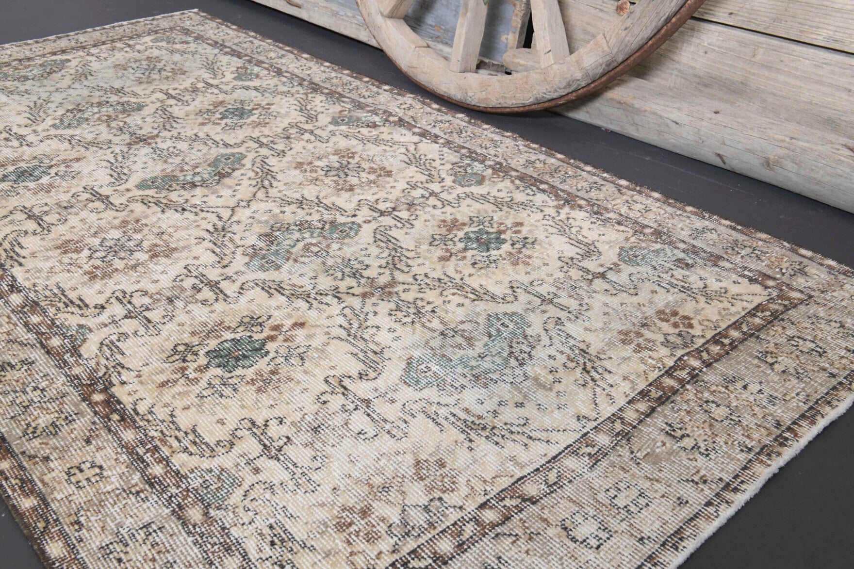 Nemertes rug: 1970s handmade Anatolian rug with floral motifs and cotton backing