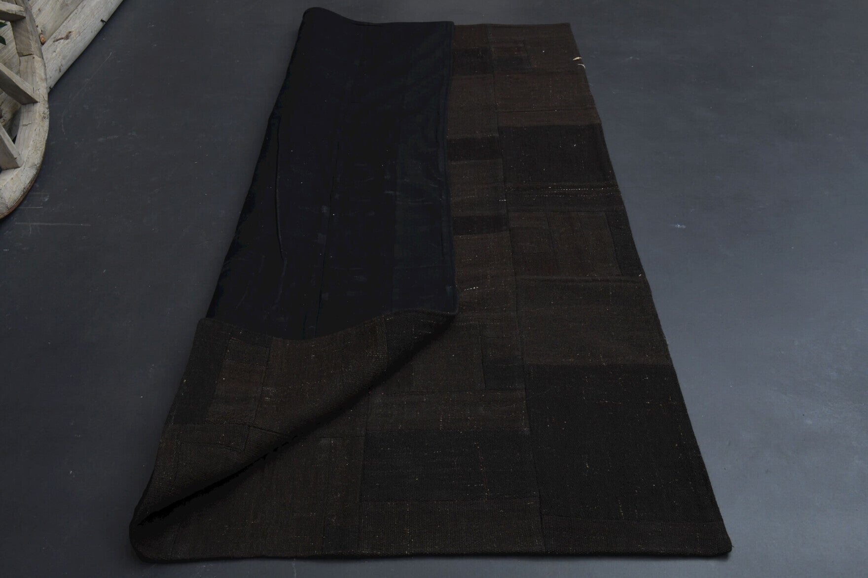 Dark Black Patchwork Vintage Area Rug in wool – 1960s piece from Anatolia, Turkey | Fame Rugs