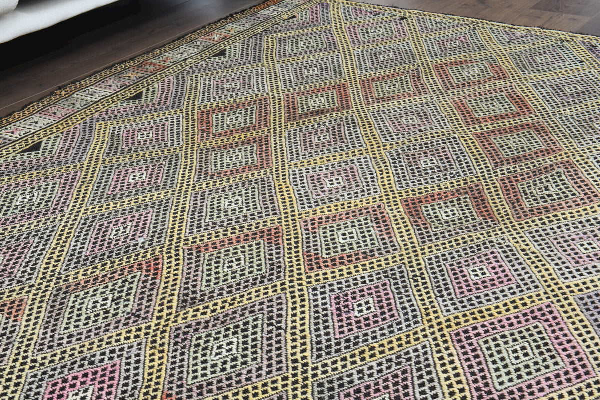 Safaksev kilim: 1960s handwoven flatweave Anatolian kilim with ikat motifs