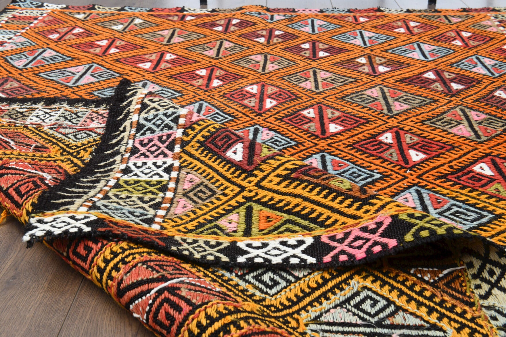 Cesme kilim: 1960s handwoven flatweave Anatolian kilim with ikat motifs