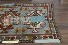 Nihanefsan rug: 1970s handmade Anatolian rug with abstract motifs and fabric backing