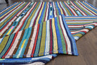 Melek kilim: 1960s handwoven flatweave Anatolian kilim with striped motifs and fabric backing